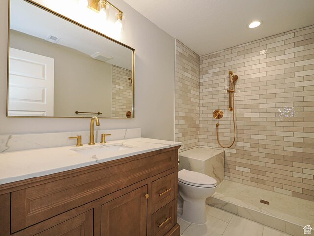 928 E Blackfeet Dr, Eagle Mountain, UT 84005 - full bath with vanity, a tile shower, and recessed lighting
