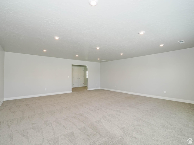 928 E Blackfeet Dr, Eagle Mountain, UT 84005 - unfurnished room with recessed lighting and light carpet