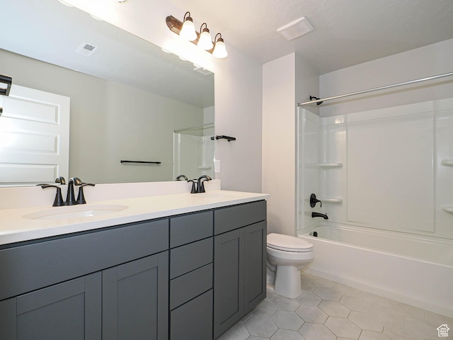 928 E Blackfeet Dr, Eagle Mountain, UT 84005 - full bath with double vanity, tile patterned floors, and tub / shower combination
