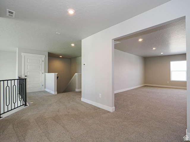 928 E Blackfeet Dr, Eagle Mountain, UT 84005 - carpeted spare room featuring recessed lighting and a textured ceiling