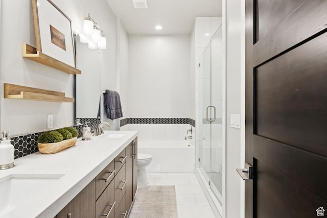 4313 Holly Frost Ct, Park City, UT 84098 - full bath with double vanity, a shower stall, a garden tub, tile patterned floors, and recessed lighting