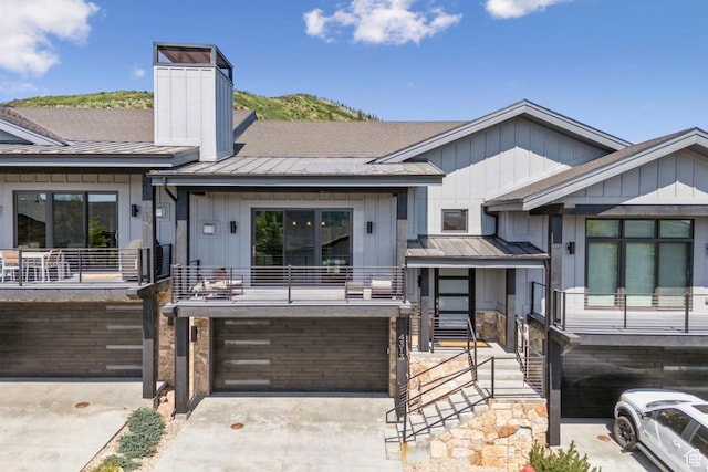 4313 Holly Frost Ct, Park City, UT 84098 - view of front of property featuring a standing seam roof, a metal roof, and an attached garage