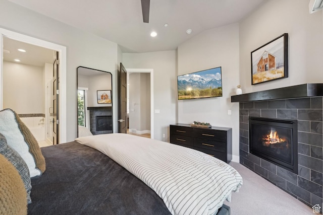 4313 Holly Frost Ct, Park City, UT 84098 - carpeted bedroom with a tiled fireplace, recessed lighting, ensuite bath, ceiling fan, and lofted ceiling