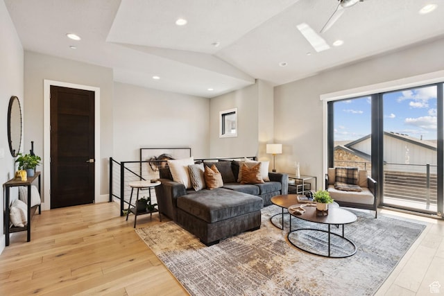 4313 Holly Frost Ct, Park City, UT 84098 - living area with light wood-style floors, lofted ceiling, a skylight, and recessed lighting