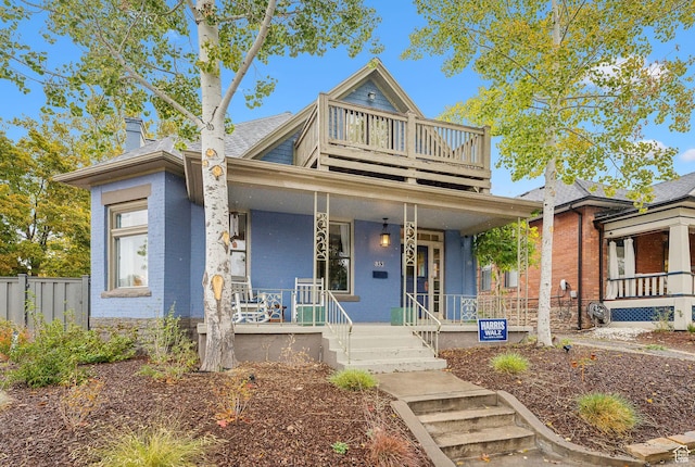 853 E Second Ave N, Salt Lake City, UT 84103 - view of front of house with covered porch, a chimney, and brick siding
