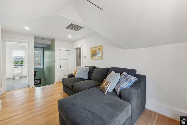 853 E Second Ave N, Salt Lake City, UT 84103 - living room featuring vaulted ceiling, wood finished floors, and recessed lighting