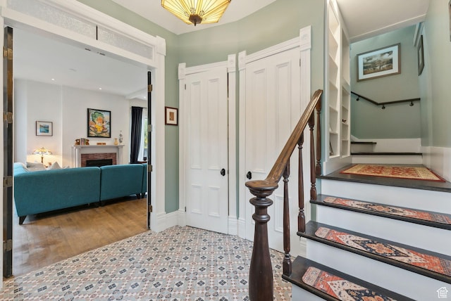 853 E Second Ave N, Salt Lake City, UT 84103 - entrance foyer with stairway and a fireplace