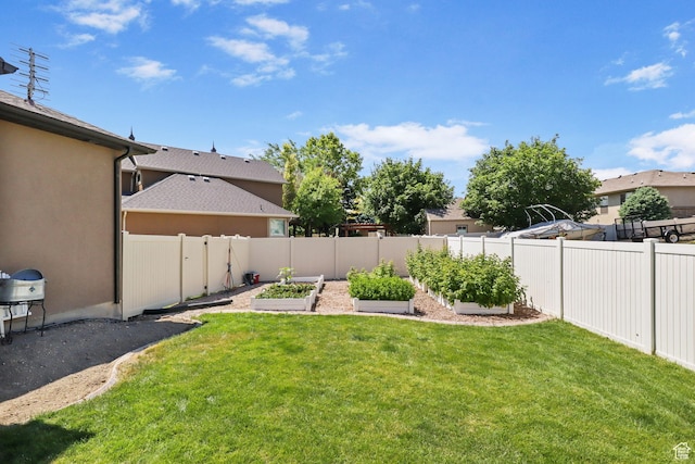 6082 W Cedar Fork Dr S, West Jordan, UT 84081 - fenced backyard featuring a garden