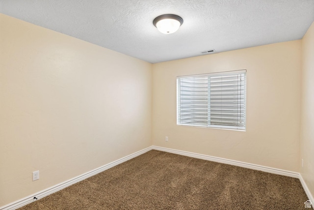 6082 W Cedar Fork Dr S, West Jordan, UT 84081 - carpeted empty room featuring baseboards and a textured ceiling