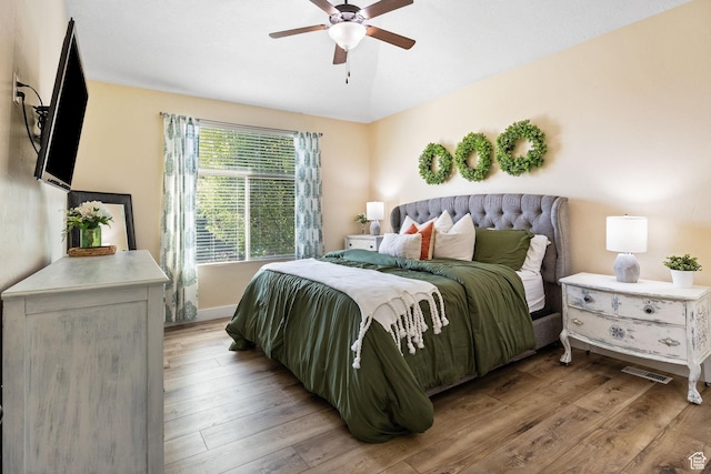 6082 W Cedar Fork Dr S, West Jordan, UT 84081 - bedroom with light wood finished floors and a ceiling fan