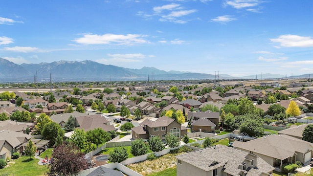 6082 W Cedar Fork Dr S, West Jordan, UT 84081 - aerial view of residential area featuring mountains