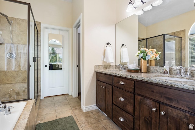 6082 W Cedar Fork Dr S, West Jordan, UT 84081 - bathroom with a stall shower, double vanity, tile patterned flooring, and a bath