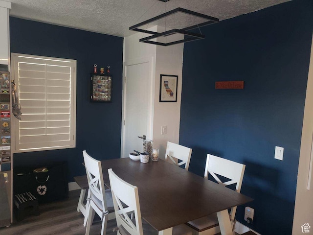 1133 E Sherman Ave S, Salt Lake City, UT 84105 - dining room with wood finished floors and a textured ceiling
