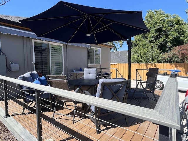 1133 E Sherman Ave S, Salt Lake City, UT 84105 - wooden terrace with outdoor dining space