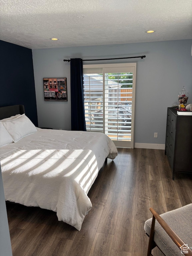1133 E Sherman Ave S, Salt Lake City, UT 84105 - bedroom featuring a textured ceiling, wood finished floors, and recessed lighting