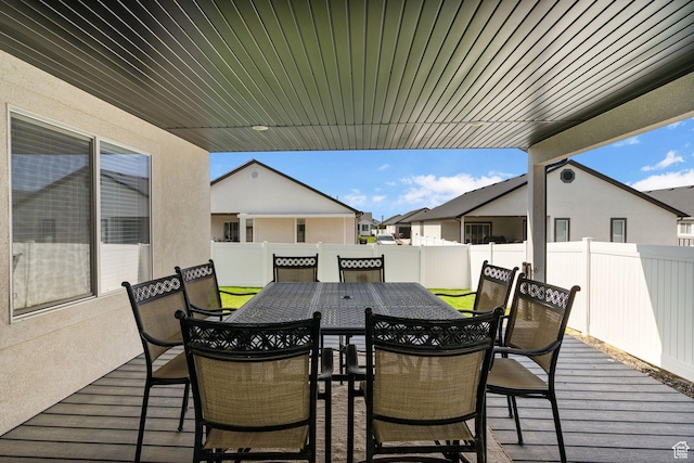 2418 E Quaking Aspen Ln, Eagle Mountain, UT 84005 - wooden terrace featuring outdoor dining area and a residential view