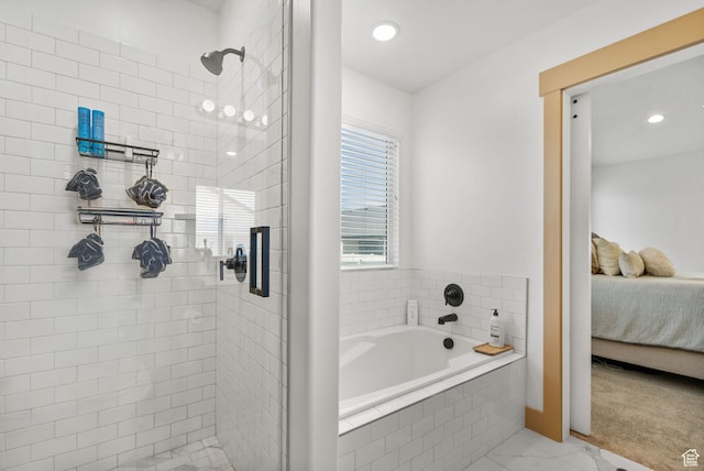 2418 E Quaking Aspen Ln, Eagle Mountain, UT 84005 - ensuite bathroom with a shower stall, a bath, marble look tiles, and recessed lighting
