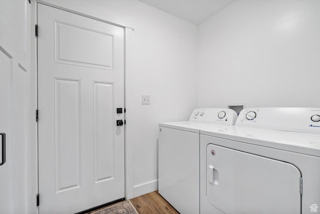 2418 E Quaking Aspen Ln, Eagle Mountain, UT 84005 - laundry area featuring separate washer and dryer and light wood-type flooring