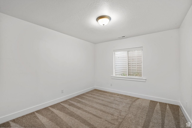 2418 E Quaking Aspen Ln, Eagle Mountain, UT 84005 - empty room with carpet flooring and a textured ceiling