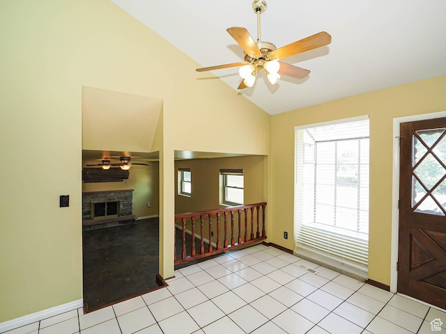 2333 W Ledgewood Dr, Taylorsville, UT 84129 - foyer entrance featuring ceiling fan, a fireplace, and high vaulted ceiling