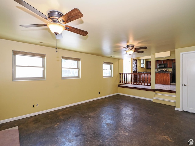 2333 W Ledgewood Dr, Taylorsville, UT 84129 - empty room featuring concrete flooring and a ceiling fan