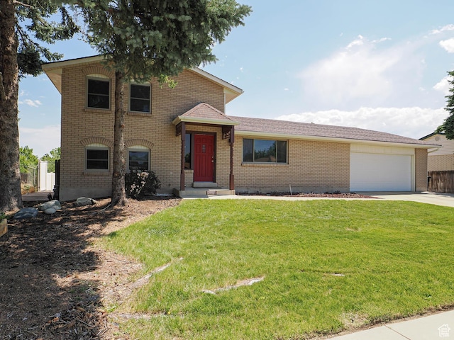 2333 W Ledgewood Dr, Taylorsville, UT 84129 - tri-level home featuring driveway, a front lawn, brick siding, and a garage