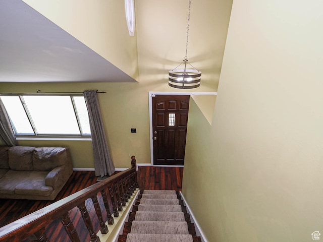 2333 W Ledgewood Dr, Taylorsville, UT 84129 - foyer with wood finished floors and baseboards