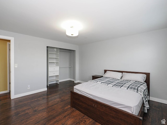 2333 W Ledgewood Dr, Taylorsville, UT 84129 - bedroom featuring a closet and dark wood-style floors