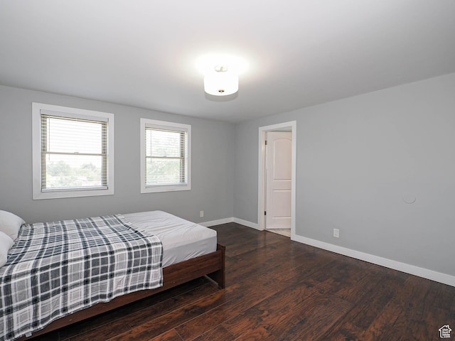 2333 W Ledgewood Dr, Taylorsville, UT 84129 - bedroom featuring wood finished floors and baseboards