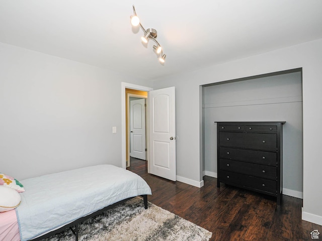 2333 W Ledgewood Dr, Taylorsville, UT 84129 - bedroom featuring wood finished floors and baseboards