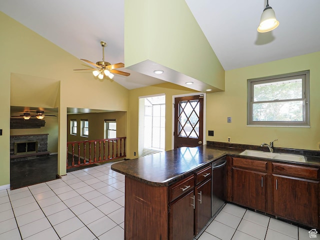 2333 W Ledgewood Dr, Taylorsville, UT 84129 - kitchen with ceiling fan, dark countertops, stainless steel dishwasher, a peninsula, and high vaulted ceiling