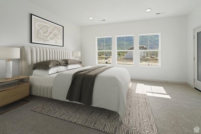 5063 W Rambutan Way S Unit 121, South Jordan, UT 84009 - carpeted bedroom featuring multiple windows and recessed lighting
