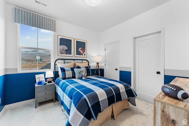 5063 W Rambutan Way S Unit 121, South Jordan, UT 84009 - bedroom featuring carpet and baseboards