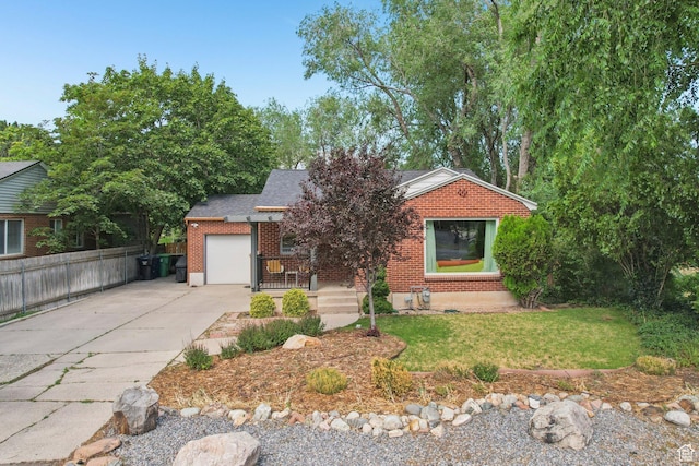 3232 S 2600 E, Salt Lake City, UT 84109 - obstructed view of property featuring a garage, driveway, and brick siding