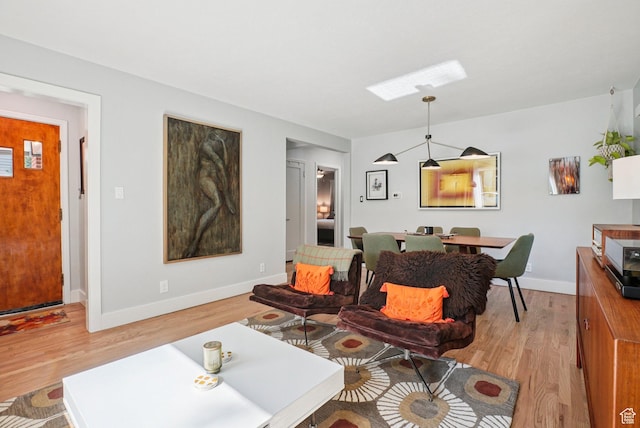 3232 S 2600 E, Salt Lake City, UT 84109 - living area featuring light wood-type flooring and a skylight