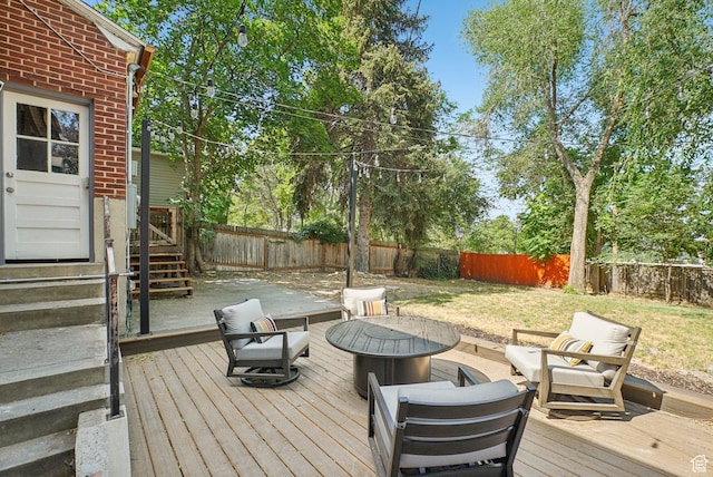 3232 S 2600 E, Salt Lake City, UT 84109 - wooden terrace featuring a fenced backyard, entry steps, and an outdoor fire pit