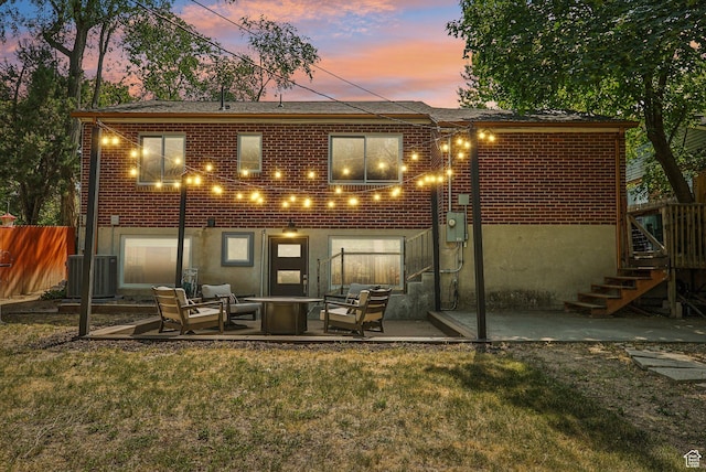 3232 S 2600 E, Salt Lake City, UT 84109 - rear view of house with a patio, an outdoor hangout area, stairs, and brick siding