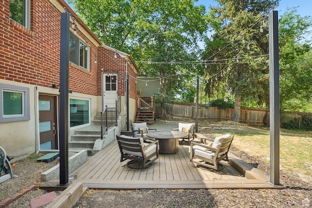 3232 S 2600 E, Salt Lake City, UT 84109 - wooden terrace featuring a fenced backyard and a fire pit