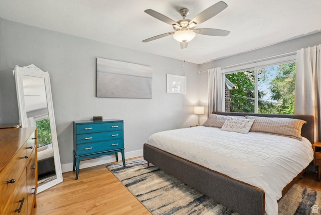 3232 S 2600 E, Salt Lake City, UT 84109 - bedroom with wood finished floors and a ceiling fan
