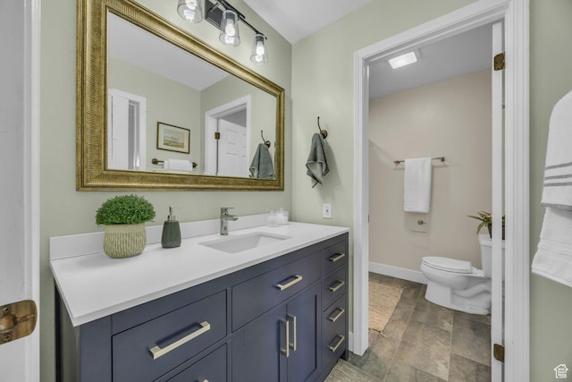 7430 S Wasatch Blvd E Unit I-2, Cottonwood Heights, UT 84121 - bathroom with vanity and toilet