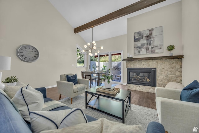 7430 S Wasatch Blvd E Unit I-2, Cottonwood Heights, UT 84121 - living area featuring wood finished floors, high vaulted ceiling, a chandelier, a glass covered fireplace, and beamed ceiling