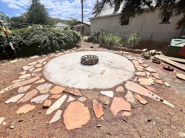 148 Duchesne St, Helper, UT 84526 - view of patio / terrace featuring a fire pit