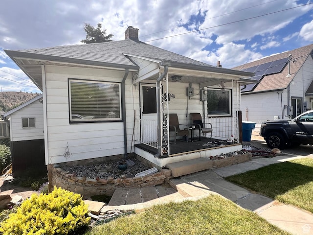 148 Duchesne St, Helper, UT 84526 - single story home with covered porch, a chimney, and roof with shingles
