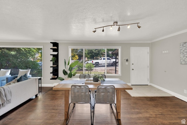 2270 E 1700 S, Salt Lake City, UT 84108 - dining space featuring crown molding, wood finished floors, and a textured ceiling