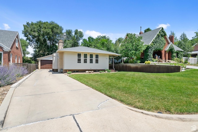 1456 Swan St, Ogden, UT 84401 - view of front of property featuring a garage, an outdoor structure, and a chimney