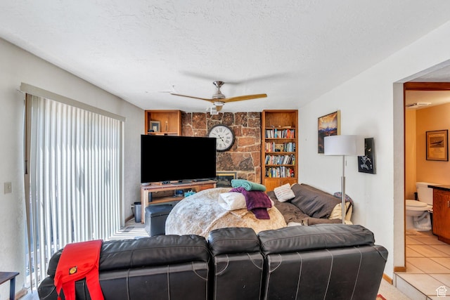 3286 Danish Hills Cir, Cottonwood Heights, UT 84121 - living area featuring ceiling fan, tile patterned floors, a textured ceiling, and built in features