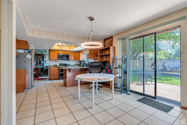 3286 Danish Hills Cir, Cottonwood Heights, UT 84121 - kitchen featuring stainless steel appliances, brown cabinetry, a textured ceiling, a peninsula, and light tile patterned flooring