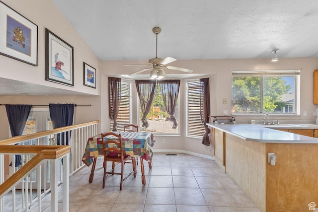 8770 S 3980 W, West Jordan, UT 84084 - dining space with ceiling fan, light tile patterned flooring, and a textured ceiling