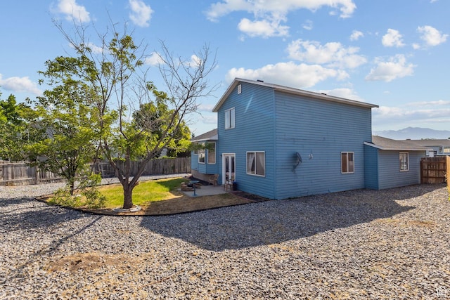 8770 S 3980 W, West Jordan, UT 84084 - back of property featuring a fenced backyard and a patio