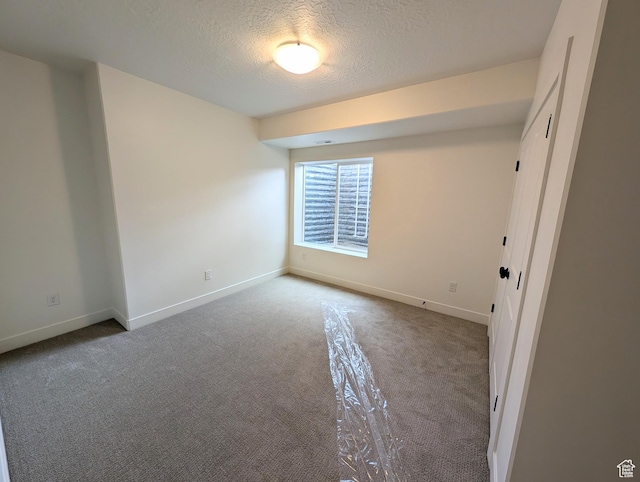 11369 S Watercourse Rd W Unit 202, South Jordan, UT 84009 - carpeted empty room with a textured ceiling and baseboards